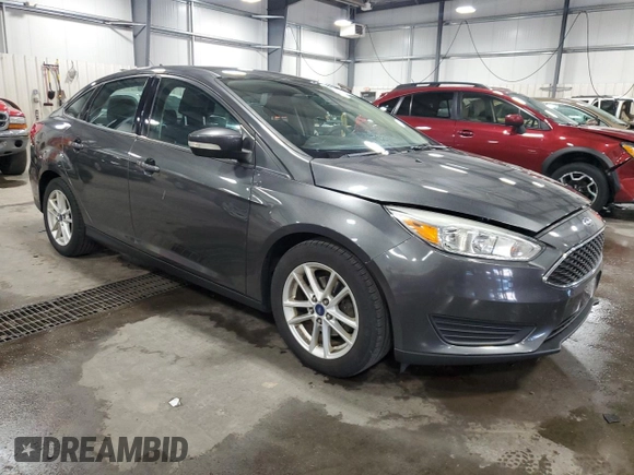 2017 Ford Focus SE with VIN 1FADP3F21HL205754, listed as a Copart auction lot 63632985 with 96,797 mi miles and Salvage title. Bid and sale history available at DreamBid. Image 4.