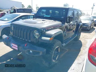 2019 Jeep Wrangler Unlimited Rubicon with VIN 1C4HJXFN1KW679028, listed as a IAAI auction lot 41654887 with 32,247 mi miles and . Bid and sale history available at DreamBid. Image 2.