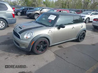 2009 MINI Hardtop S with VIN WMWMF73569TW87929, listed as a IAAI auction lot 42057214 with 164,922 mi miles and . Bid and sale history available at DreamBid. Image 2.