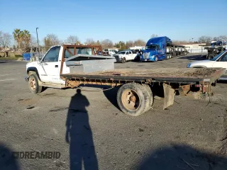 1991 GMC Sierra 1500 with VIN 1GDKC34N5MJ510668, listed as a Copart auction lot 42041115 with 294,934 mi miles and Clean Title. Bid and sale history available at DreamBid. Image 2.