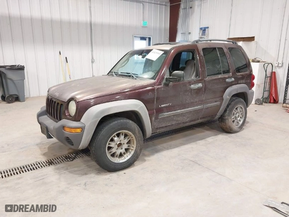 2004 Jeep Liberty Sport with VIN 1J4GL48K64W263786, listed as a IAAI auction lot 41825993 with 256,640 mi miles. Bid and sale history available at carsss.com. Image 2.