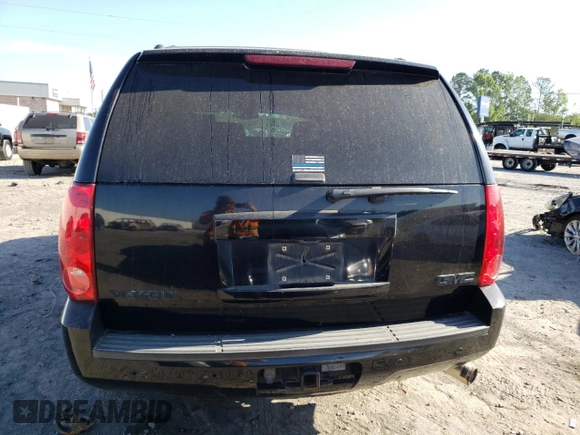 2009 GMC Yukon SLT w/4SA with VIN 1GKFC33J99R297063, listed as a Copart auction lot 53212104 with 289,213 mi miles and Salvage Title. Bid and sale history available at carsss.com. Image 6.