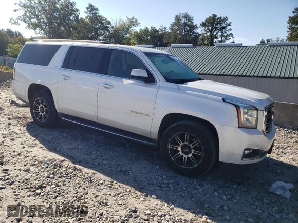 2016 GMC Yukon XL SLT with VIN 1GKS2GKC4GR198451, listed as a Copart auction lot 70073714 with 194,939 mi miles and Salvage Title. Bid and sale history available at carsss.com. Image 4.