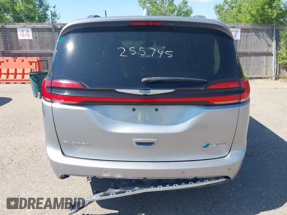 2021 Chrysler Pacifica Hybrid Touring L with VIN 2C4RC1L76MR594571, listed as a IAAI auction lot 40255745 with 58,163 mi miles and . Bid and sale history available at DreamBid. Image 16.
