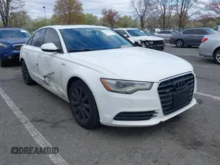 2013 Audi A6 Premium Plus z VIN WAUGGAFCXDN124879, wystawiony jako IAAI lot #42041791 z przebiegiem 162 388 mil mil oraz . Historia ofert i sprzedaży dostępna na DreamBid. Obrazek 1.