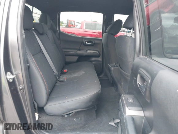 2017 Toyota Tacoma SR5 with VIN 3TMDZ5BN3HM027098, listed as a IAAI auction lot 42409977 with 97,224 mi miles and . Bid and sale history available at DreamBid. Image 8.