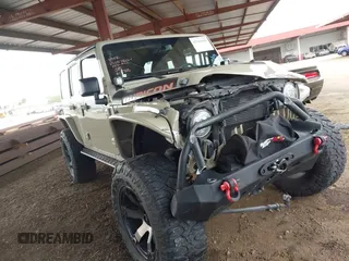 2017 Jeep Wrangler Unlimited Rubicon z VIN 1C4BJWFG7HL663203, wystawiony jako IAAI lot #42391999 z przebiegiem 63 430 mil mil oraz . Historia ofert i sprzedaży dostępna na DreamBid. Obrazek 1.