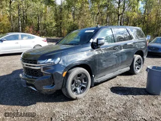 2021 Chevrolet Tahoe Commercial with VIN 1GNSKLED4MR476230, listed as a Copart auction lot 75313974 with 124,085 mi miles and Salvage Title. Bid and sale history available at carsss.com. Image 1.