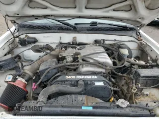 2002 Toyota Tacoma z VIN 5TEWN72N42Z895430, wystawiony jako Copart lot #57458155 z przebiegiem Nie podano mil oraz Szkoda całkowita • Salvage title. Historia ofert i sprzedaży dostępna na DreamBid. Obrazek 11.