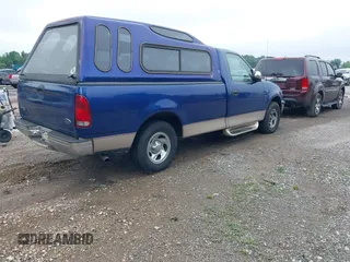 1998 Ford F-150 with VIN 1FTZF1725WNB76296, listed as a IAAI auction lot 42278511 with 223,324 mi miles and . Bid and sale history available at DreamBid. Image 4.