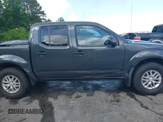 2015 Nissan Frontier SV with VIN 1N6AD0EV6FN751948, listed as a IAAI auction lot 42063935 with 52,244 mi miles and . Bid and sale history available at DreamBid. Image 13.