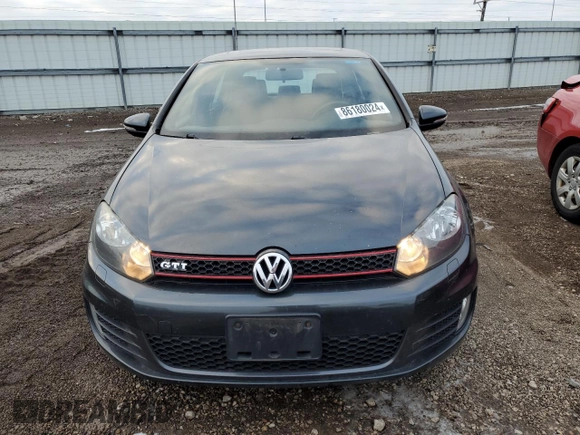 2010 Volkswagen GTI with VIN WVWHV7AJ2AW400192, listed as a Copart auction lot 86180024 with 124,705 mi miles and Salvage Title. Bid and sale history available at carsss.com. Image 5.