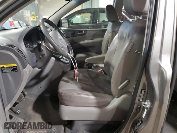2011 Kia Sedona EX with VIN KNDMH4C79B6398495, listed as a Copart auction lot 47064174 with 169,328 mi miles and Salvage Title. Bid and sale history available at carsss.com. Image 7.