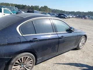 2014 BMW 3 Series 335i with VIN WBA3A9C54EF477943, listed as a IAAI auction lot 41632554 with 102,273 mi miles. Bid and sale history available at carsss.com. Image 13.