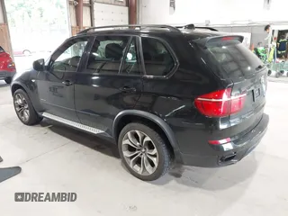 2012 BMW X5 50i with VIN 5UXZV8C50CL425721, listed as a IAAI auction lot 42590676 with 192,355 mi miles and . Bid and sale history available at DreamBid. Image 3.