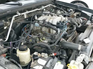 2003 Nissan Frontier XE z VIN 1N6ED29Y23C415075, wystawiony jako IAAI lot #42517910 z przebiegiem 156 084 mil mil oraz . Historia ofert i sprzedaży dostępna na DreamBid. Obrazek 14.