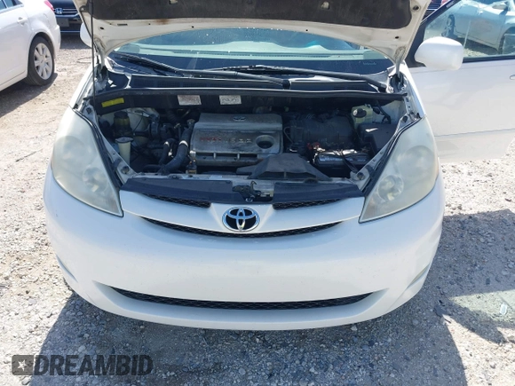2006 Toyota Sienna XLE with VIN 5TDZA22C06S576958, listed as a IAAI auction lot 41978892 with 257,598 mi miles. Bid and sale history available at carsss.com. Image 10.