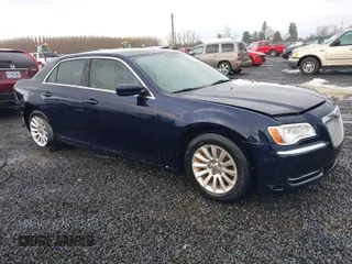2012 Chrysler 300 with VIN 2C3CCAAG7CH142422, listed as a IAAI auction lot 41555202 with 134,864 mi miles. Bid and sale history available at carsss.com. Image 1.