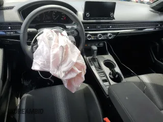2025 Honda Civic Sport z VIN 2HGFE2F52SH520064, wystawiony jako Copart lot #56580945 z przebiegiem 4947 mil mil oraz Nie do naprawy. Historia ofert i sprzedaży dostępna na DreamBid. Obrazek 8.