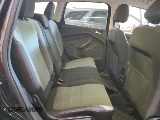 2016 Ford Escape SE z VIN 1FMCU9GXXGUA99014, wystawiony jako Copart lot #56494855 z przebiegiem 37 883 mil mil oraz Szkoda całkowita • Salvage title. Historia ofert i sprzedaży dostępna na DreamBid. Obrazek 10.
