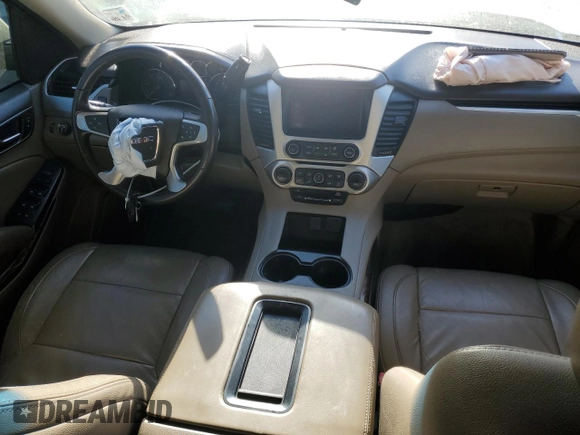 2015 GMC Yukon SLE with VIN 1GKS1AKC4FR265208, listed as a Copart auction lot 42324245 with 105,760 mi miles and Salvage Title. Bid and sale history available at carsss.com. Image 8.