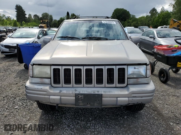 1998 Jeep Grand Cherokee Limited с VIN 1J4GZ78Y0WC245194, выставлен на аукционе Copart как лот 57838825 с пробегом 199 412 миль миль и Списание • Salvage title. История ставок и продаж доступна на DreamBid. Изображение 5.