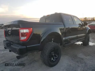 2021 Ford F-150 XL with VIN 1FTFW1E5XMFB70288, listed as a Copart auction lot 87917535 with 35,111 mi miles and Salvage Title. Bid and sale history available at carsss.com. Image 3.