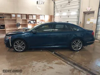 2018 Volkswagen Passat 2.0T S with VIN 1VWAA7A38JC013787, listed as a IAAI auction lot 41587362 with 127,970 mi miles. Bid and sale history available at carsss.com. Image 15.