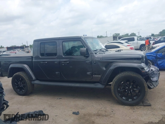 2021 Jeep Gladiator Overland with VIN 1C6HJTFG4ML617175, listed as a IAAI auction lot 42148031 with 70,627 mi miles and . Bid and sale history available at DreamBid. Image 13.