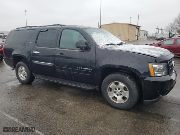 2014 Chevrolet Suburban LT with VIN 1GNSKJE70ER228623, listed as a Copart auction lot 45020335 with 167,671 mi miles and Salvage Title. Bid and sale history available at carsss.com. Image 4.
