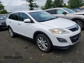 2012 Mazda CX-9 Grand Touring with VIN JM3TB3DV9C0338460, listed as a Copart auction lot 59548495 with 219,060 mi miles and Salvage title. Bid and sale history available at DreamBid. Image 4.