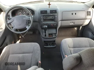 2003 Kia Sedona LX with VIN KNDUP131236453481, listed as a Copart auction lot 75660244 with 125,628 mi miles and Salvage Title. Bid and sale history available at carsss.com. Image 8.
