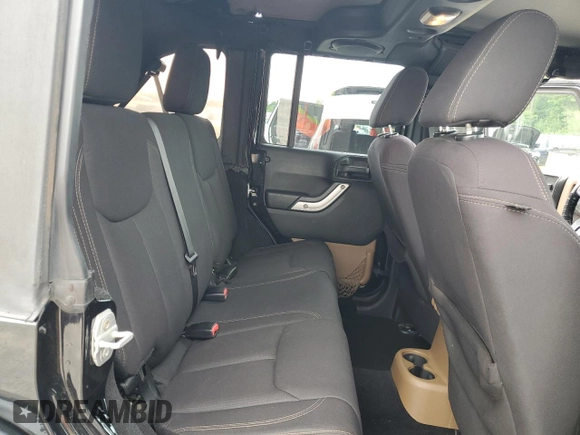 2013 Jeep Wrangler Unlimited Sahara with VIN 1C4HJWEG9DL701391, listed as a Copart auction lot 60492325 with 117,584 mi miles and Salvage title. Bid and sale history available at DreamBid. Image 10.