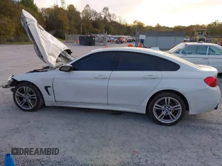 2015 BMW 4 Series 428i xDrive z VIN WBA4C9C57FD330866, wystawiony jako IAAI lot #40574326 z przebiegiem 123 726 mil mil oraz . Historia ofert i sprzedaży dostępna na DreamBid. Obrazek 14.