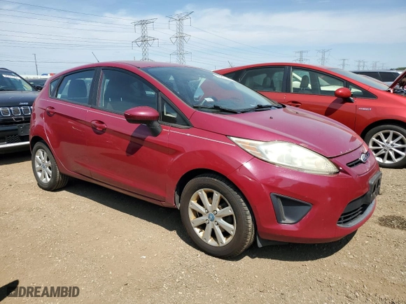 2011 Ford Fiesta SE with VIN 3FADP4EJ7BM108577, listed as a Copart auction lot 66297714 with 136,344 mi miles and Clean Title. Bid and sale history available at carsss.com. Image 4.