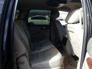 2012 Chevrolet Suburban LT with VIN 1GNSCJE05CR146514, listed as a Copart auction lot 28413650 with 230,681 mi miles and Salvage Title. Bid and sale history available at carsss.com. Image 6.