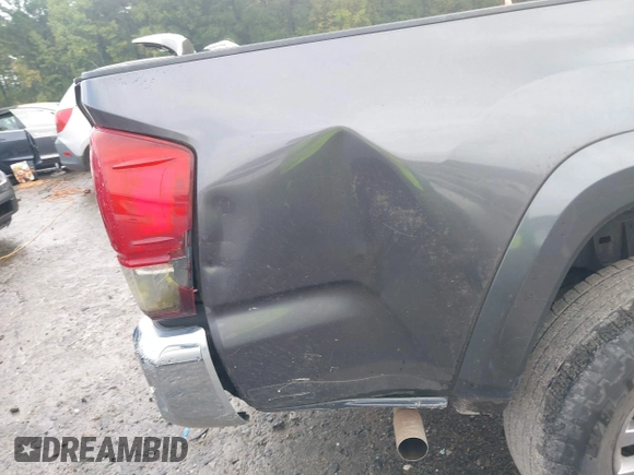 2016 Toyota Tacoma SR with VIN 5TFRX5GN6GX070766, listed as a IAAI auction lot 40461070 with 144,039 mi miles and . Bid and sale history available at DreamBid. Image 19.