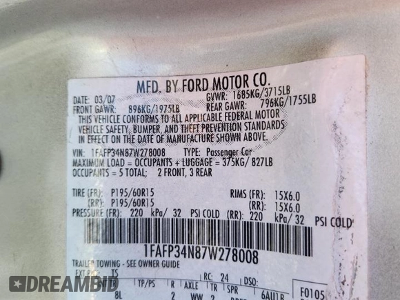 2007 Ford Focus S with VIN 1FAFP34N87W278008, listed as a Copart auction lot 61022545 with 139,575 mi miles and Salvage title. Bid and sale history available at DreamBid. Image 12.