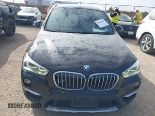 2016 BMW X1 xDrive28i with VIN WBXHT3Z3XG4A48557, listed as a IAAI auction lot 41387960 with 84,821 mi miles. Bid and sale history available at carsss.com. Image 6.