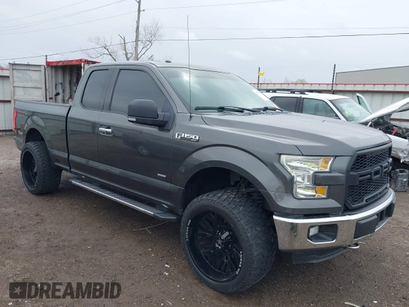 2015 Ford F-150 XLT with VIN 1FTEX1EP9FFC75210, listed as a IAAI auction lot 39041797 with 125,522 mi miles. Bid and sale history available at carsss.com. Image 1.