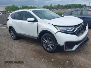 2021 Honda CR-V Touring with VIN 5J6RW2H93ML012016, listed as a IAAI auction lot 42365715 with 55,114 mi miles and . Bid and sale history available at DreamBid. Image 1.