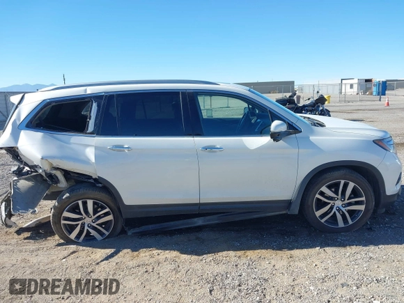 2018 Honda Pilot Touring z VIN 5FNYF6H98JB032821, wystawiony jako IAAI lot #41012077 z przebiegiem 110 321 mil mil oraz . Historia ofert i sprzedaży dostępna na DreamBid. Obrazek 13.