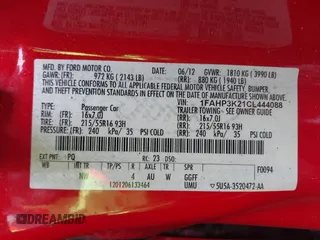 2012 Ford Focus SE z VIN 1FAHP3K21CL444088, wystawiony jako IAAI lot #42242725 z przebiegiem 145 604 mil mil oraz . Historia ofert i sprzedaży dostępna na DreamBid. Obrazek 9.