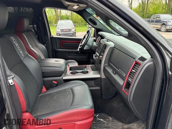 2016 Ram 1500 Rebel z VIN 1C6RR7YT2GS171455, wystawiony jako Copart lot #54708635 z przebiegiem 150 421 mil mil oraz Tytuł czysty. Historia ofert i sprzedaży dostępna na DreamBid. Obrazek 5.