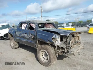2019 Toyota Tacoma SR z VIN 5TFCZ5AN1KX209591, wystawiony jako IAAI lot #41844496 z przebiegiem 47 622 mil mil oraz . Historia ofert i sprzedaży dostępna na DreamBid. Obrazek 1.