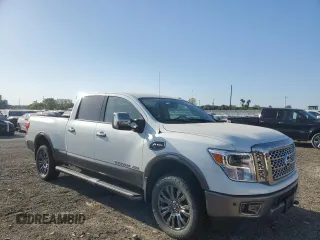 2017 Nissan Titan XD PRO-4X with VIN 1N6BA1F44HN541022, listed as a Copart auction lot 73966134 with 66,582 mi miles and Salvage Title. Bid and sale history available at carsss.com. Image 4.