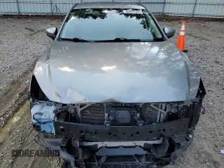 2014 Mazda 3 i Touring with VIN JM1BM1V75E1146162, listed as a Copart auction lot 63657205 with 117,840 mi miles and Salvage title. Bid and sale history available at DreamBid. Image 5.