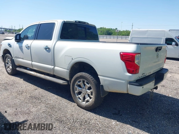 2018 Nissan Titan XD SV with VIN 1N6BA1F46JN526690, listed as a IAAI auction lot 41989215 with 129,626 mi miles. Bid and sale history available at carsss.com. Image 3.