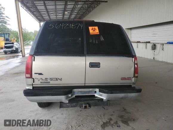 1999 GMC Yukon with VIN 1GKEC13R4XJ735246, listed as a Copart auction lot 56429874 with 258,616 mi miles and Salvage Title. Bid and sale history available at carsss.com. Image 6.