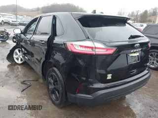 2021 Ford Edge SE with VIN 2FMPK4G99MBA22681, listed as a IAAI auction lot 41576016 with 92,457 mi miles and . Bid and sale history available at DreamBid. Image 3.